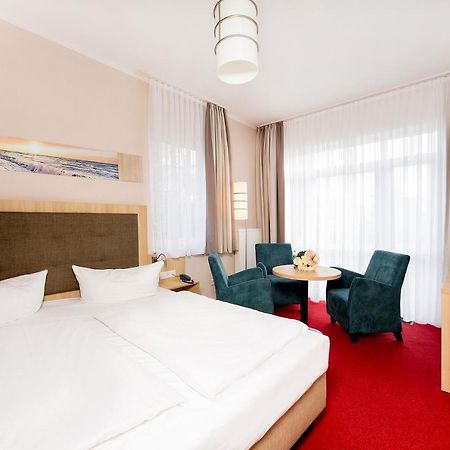 הרינגסדורף Hotel Garni Sonne מראה חיצוני תמונה