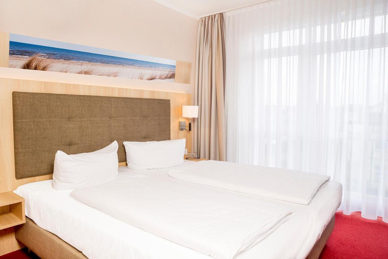 הרינגסדורף Hotel Garni Sonne מראה חיצוני תמונה